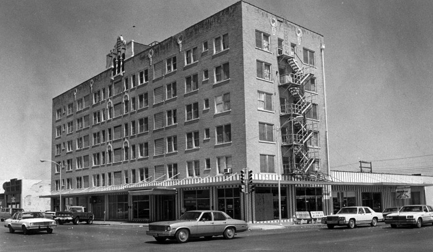 File- This undated file photo shows The Naylor Hotel, at Concho Avenue and Chadbourne Street, in San Angelo, Texas, which became the Town House in the mid-1950s. It began as a glorious two-story hotel in 1881, owned by the son of Carl Nimitz, who owned the Nimitz Hotel in Fredericksburg. The hotel was obliterated by fire in 1883 in a murder cover-up, according to Standard-Times archives. The cook killed his kitchen helper and set a fire to cover up the deed. That was the first tragedy in a long line at the location. (The San Angelo Standard-Times via AP, File)