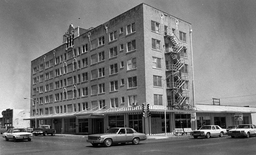 File- This undated file photo shows The Naylor Hotel, at Concho Avenue and Chadbourne Street, in San Angelo, Texas, which became the Town House in the mid-1950s. It began as a glorious two-story hotel in 1881, owned by the son of Carl Nimitz, who owned the Nimitz Hotel in Fredericksburg. The hotel was obliterated by fire in 1883 in a murder cover-up, according to Standard-Times archives. The cook killed his kitchen helper and set a fire to cover up the deed. That was the first tragedy in a long line at the location. (The San Angelo Standard-Times via AP, File)