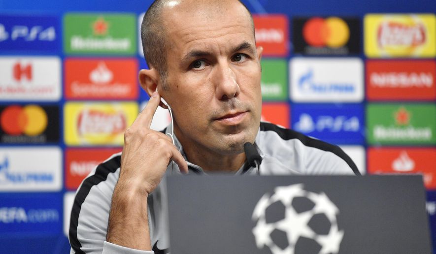 FILE - In this Oct. 2 2018 file photo, Monaco head coach Leonardo Jardim listens, during a press conference, a day ahead of the Champions League group A soccer match between Borussia Dortmund and AS Monaco in Dortmund, Germany. Monaco has fired coach Leonardo Jardim following a run of four straight losses that has left the team in the French league&#39;s relegation zone and in last place in its Champions League group. (AP Photo/Martin Meissner, File)