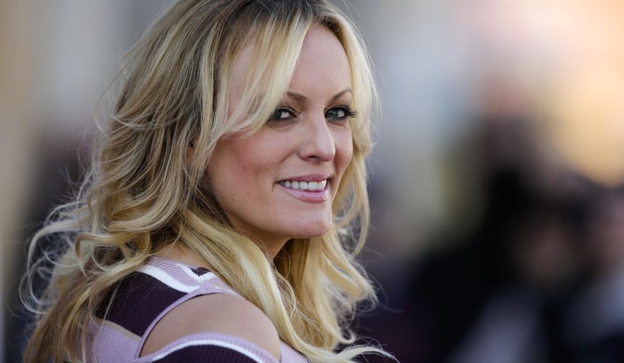 Adult film actress Stormy Daniels attends the opening of the adult entertainment fair &#39;Venus&#39; in Berlin, Germany, Thursday, Oct. 11, 2018. (AP Photo/Markus Schreiber)