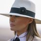 In this Oct. 6, 2018 photo, First lady Melania Trump pauses as she speaks to media during a visit to the historical Giza Pyramids site near Cairo, Egypt. First lady Melania Trump says she thinks she’s among the most bullied people in the world and there are people in the White House she and President Donald Trump can’t trust.  (AP Photo/Carolyn Kaster)