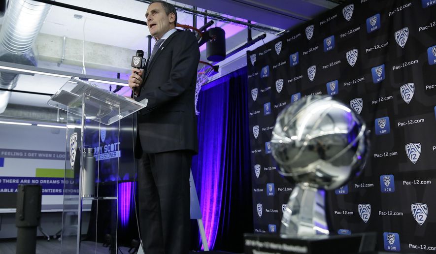 Pac-12 Commissioner Larry Scott speaks during the Pac-12 NCAA college basketball media day Thursday, Oct. 11, 2018, in San Francisco. (AP Photo/Eric Risberg)
