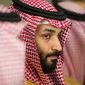 FILE - In this March 22, 2018, file photo, Saudi Crown Prince Mohammed bin Salman meets with U.S. Defense Secretary Jim Mattis at the Pentagon in Washington. In a kingdom once ruled by an-ever aging rotation of elderly monarchs, Saudi Crown Prince Mohammed bin Salman stands out as a youthful face of a youthful nation. But behind a carefully coiffed public-relations operation highlighting images of him smiling in meetings with the world’s top business executives and leaders like President Donald Trump, a darker side lurks as well.(AP Photo/Cliff Owen, File)