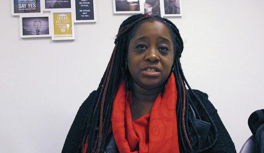 In this Oct. 3, 2018, photograph, Kiah Morris, a former Vermont state representative, discusses threats and harassment she's faced, during an interview in Bennington, Vt. Morris, the only black woman in the Vermont legislature, has resigned. (AP Photo/Lisa Rathke)