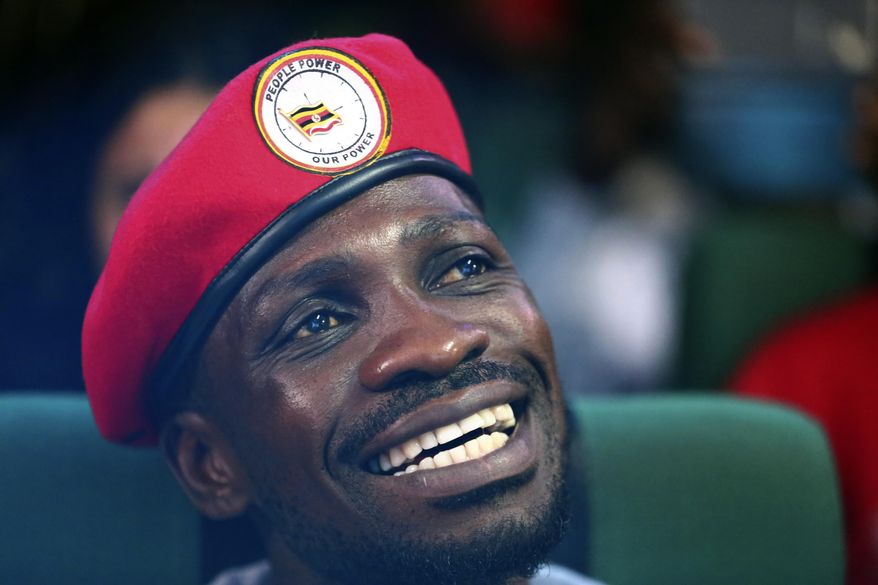 In this photo taken on Friday Oct. 12, 2018, Kyadondo MP Robert Kyagulanyi alias Bobi Wine smiles, during a visit to Nairobi, Kenya. Popular young opposition leaders from East Africa say they are uniting efforts with others in West and Southern Africa to form a movement to drive change against the misrule that has plagued the continent. Kenyan legislator Babu Owino said late Friday in a talk with Ugandan pop star-turned-opposition figure Robert Kyagulanyi and Kenyan activist-turned-politician Boniface Mwangi they are reaching out to South Africa's Julius Malema and Zimbabwe's Nelson Chamisa, among others. (AP Photo/Brian Inganga)