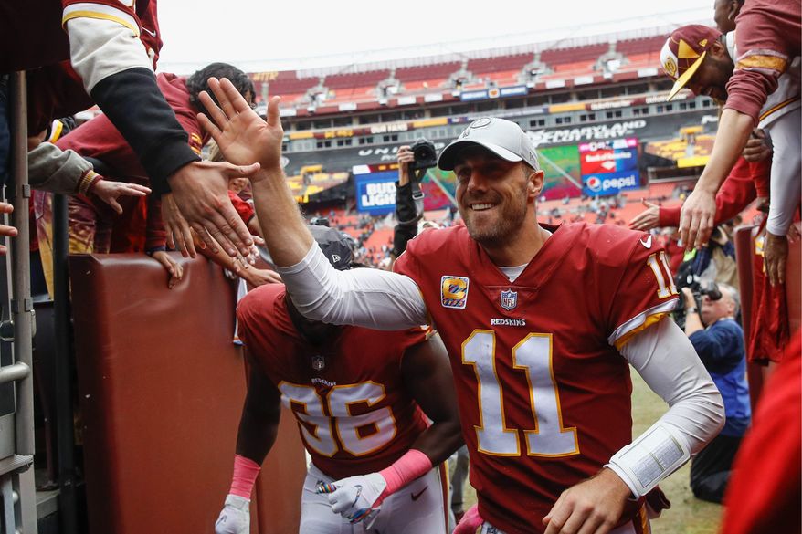 Redskins quarterback Alex Smith staked Washington to a two-touchdown lead in the first quarter and finished 21-for-36 passing for 163 yards in Sunday's victory over the Carolina Panthers. (Associated Press)