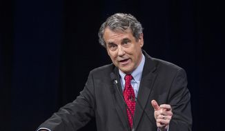 Sen. Sherrod Brown, D-Ohio speaks during a debate at the Idea Center in Playhouse Square, Sunday, Oct. 14, 2018, in Cleveland. (AP Photo/Phil Long, Pool)
