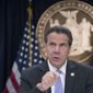 FILE - In a Friday, Sept. 14, 2018 file photo, New York Gov. Andrew Cuomo speaks to reporters during a news conference, in New York. Gov. Andrew Cuomo questioned Sunday, Oct. 14, 2018 why state Republicans would have invited the founder of a far-right group to speak in Manhattan, and he blamed them and President Donald Trump for violent clashes that took place after the speech.  (AP Photo/Mary Altaffer, File)