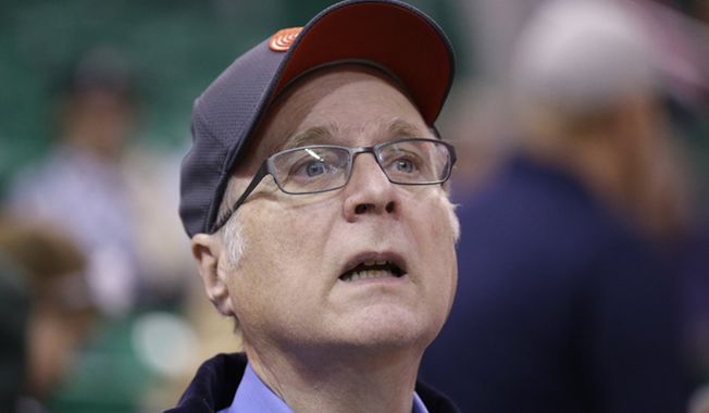 In this Oct. 12, 2015, file photo, Portland Trail Blazers owner Paul Allen looks on before the start of the first quarter of an NBA preseason basketball game against the Utah Jazz in Salt Lake City. Allen, billionaire owner of the Trail Blazers and the Seattle Seahawks and Microsoft co-founder, says cancer he was treated for in 2009 has returned. Allen made the announcement Monday, Oct. 1, 2018 on Twitter, saying he recently learned of the non-Hodgkin&#x27;s lymphoma and that his team of doctors has started treatment. (AP Photo/Rick Bowmer, File)