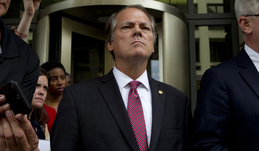 FILE - In this  June 13, 2018, file photo,  James Wolfe former director of security with the Senate Intelligence Committee leaves the federal courthouse, in Washington. James Wolfe appeared in federal court in Washington on Monday, Oct. 15, 2018, and pleaded guilty to a single charge in the three-count indictment against him. (AP Photo/Jose Luis Magana, File)