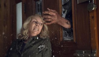 This image released by Universal Pictures shows Jamie Lee Curtis in a scene from &amp;quot;Halloween,&amp;quot; in theaters nationwide on Oct. 19. (Ryan Green/Universal Pictures via AP)