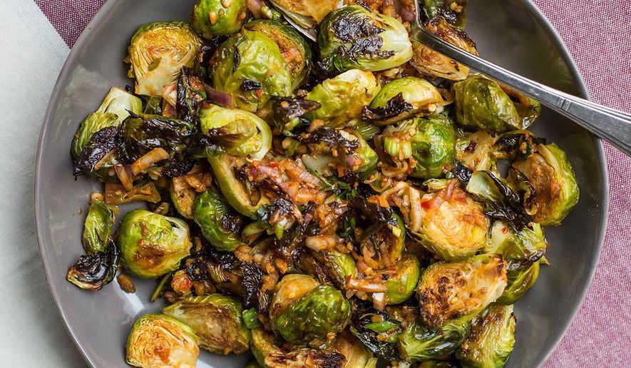 This April 2017 photo shows spicy Brussels sprouts. This dish is from a recipe by Katie Workman. (Sarah Crowder via AP)