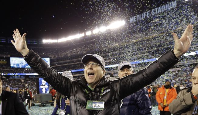 FILE - In this Feb. 2, 2014 file photo, Seattle Seahawks owner Paul Allen celebrates after the NFL Super Bowl XLVIII football game against the Denver Broncos in East Rutherford, N.J. The Seahawks won 43-8. Allen, billionaire owner of the Trail Blazers and the Seattle Seahawks and Microsoft co-founder, died Monday, Oct. 15, 2018 at age 65. Earlier this month Allen said the cancer he was treated for in 2009, non-Hodgkin’s lymphoma, had returned.  (AP Photo/Mark Humphrey, File)
