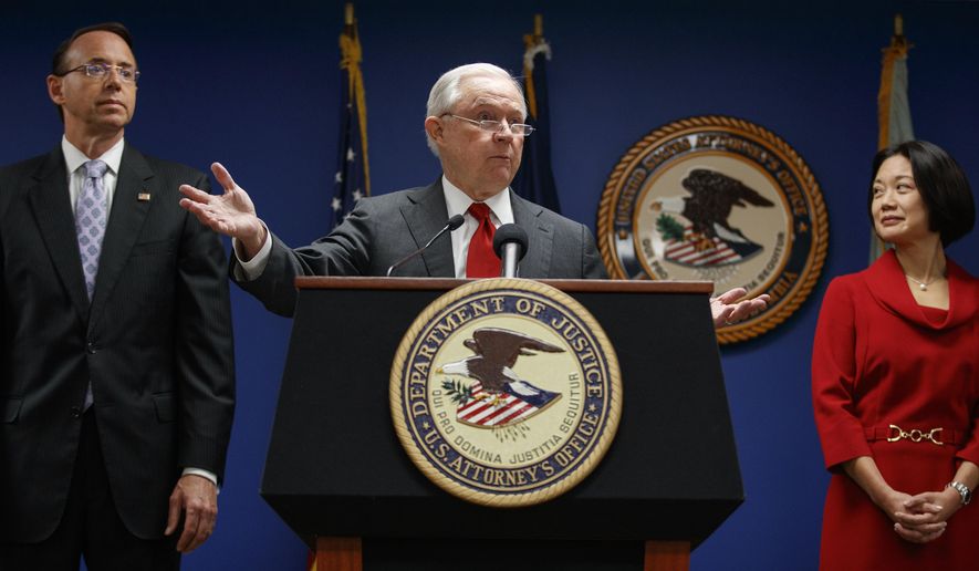 Attorney General Jeff Sessions, joined by Deputy Attorney General Rod Rosenstein, left, and Jessie Liu, U.S. Attorney for the District of Columbia, right, speaks during a news conference at the U.S. Attorney's Office for the District of Columbia in Washington, Monday, Oct. 15, 2018, to announce on efforts to reduce transnational crime. (AP Photo/Carolyn Kaster)