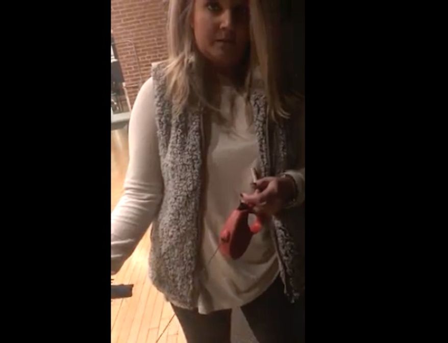A white woman was fired from her job Sunday after a video showing her blocking a black man from entering his St. Louis apartment building went viral. (D'Arreion Nuriyah Toles)