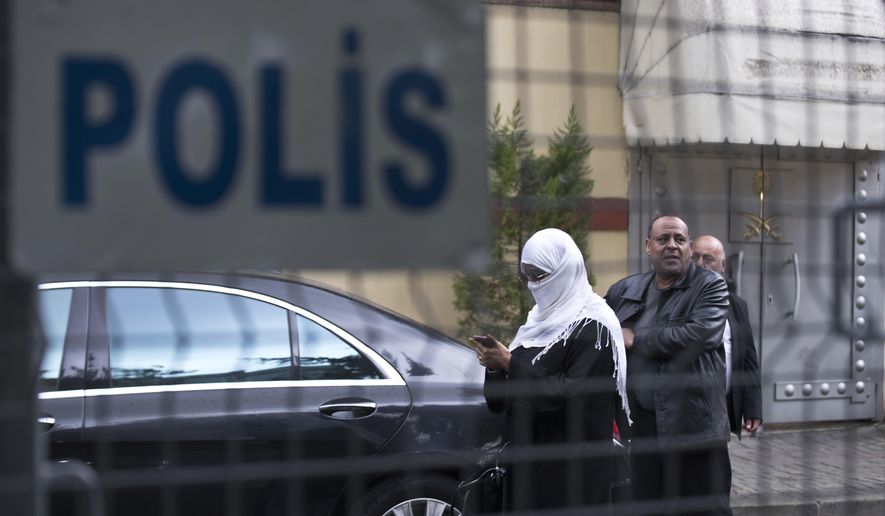 Visitors leave the Saudi Arabia&#39;s consulate in Istanbul, Turkey, Monday, Oct. 15, 2018.  Saudi journalist writer Jamal Khashoggi, is thought to have vanished after he walked into the consulate on Oct. 2, leading to worldwide speculation over his disappearance. (AP Photo/Petros Giannakouris)