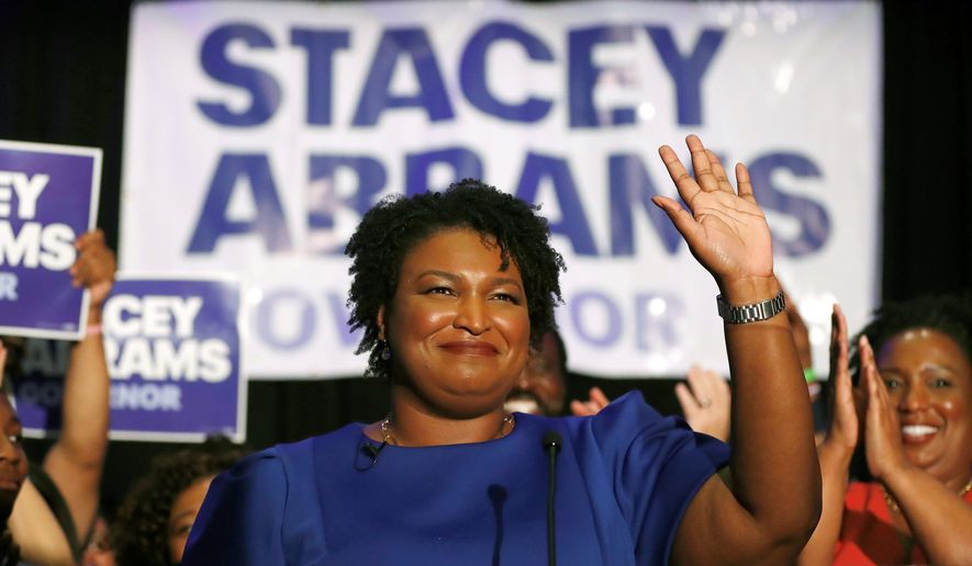 Georgia Democratic candidate Stacey Abrams is trying to become the nation&#x27;s first female black governor. Real Clear Politics average gives her opponent Brian Kemp a 2-percentage point lead. (Associated Press)