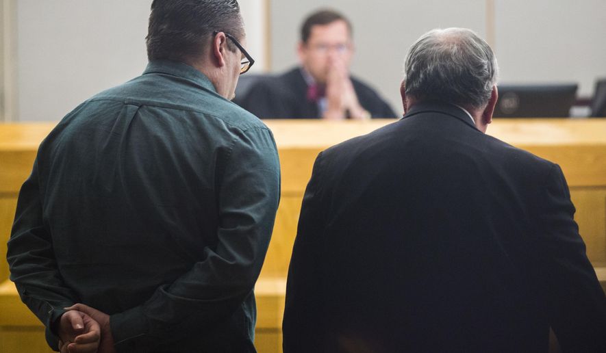 In this Monday, Oct. 15, 2018 photo, Charles Phifer, left, is found guilty of capital murder at the Frank Crowley Courts Building in Dallas. The charge is for the March 2016 beating death of 4-year-old Leiliana Wright. The verdict came with an automatic sentence of life in prison without parole. (Ashley Landis/The Dallas Morning News via AP)