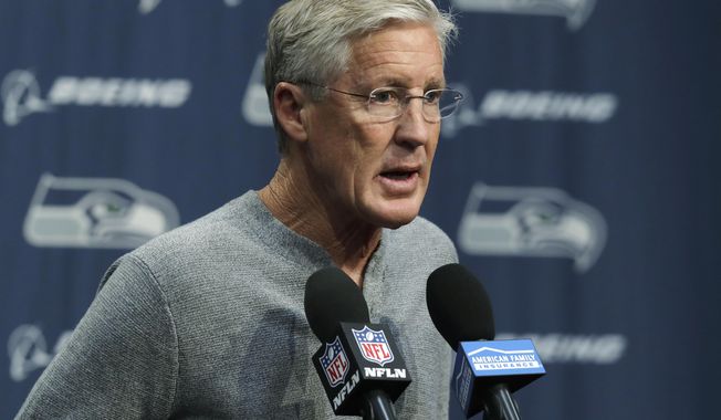 Seattle Seahawks NFL football head coach Pete Carroll talks to reporters Tuesday, Oct. 16, 2018, at Seahawks headquarters in Renton, Wash. Carroll spent most of his weekly press conference talking about team owner Paul Allen, who died Monday, Oct. 15, 2018 in Seattle. (AP Photo/Ted S. Warren)