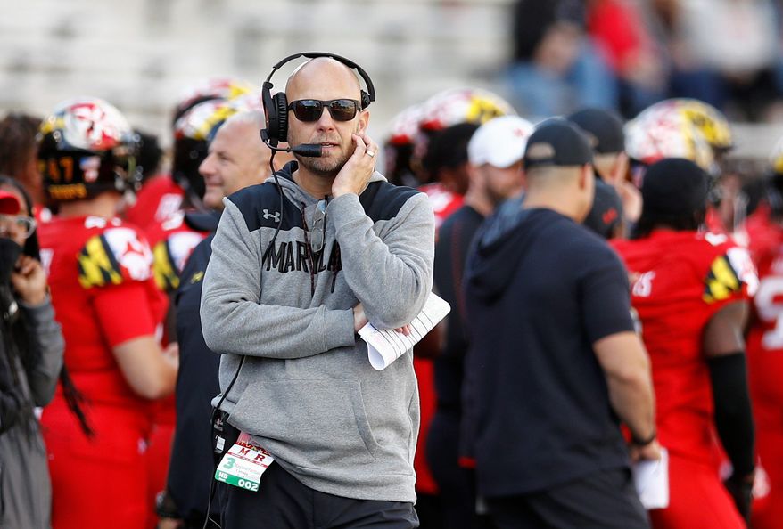 FILE - In this Saturday, Oct. 13, 2018, file photo Maryland interim head coach Matt Canada walks on the sideline during the second half of an NCAA college football game against Rutgers in College Park, Md. The Terrapins (4-2, 2-1) will be going for a second win over a ranked opponent when they visit the No. 19 Iowa Hawkeyes (5-1, 2-1) on Saturday. (AP Photo/Patrick Semansky, File) **FILE**

