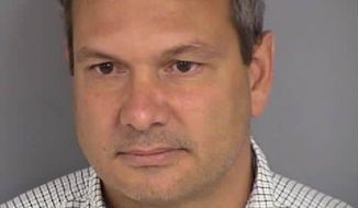 This undated photo provided by the las Vegas Department of Public Safety shows Wilfred Michael Stark, 50, of Falls Church, Va. Authorities say Stark was arrested Tuesday, Oct. 16, 2018, on a misdemeanor battery charge after he was accused of pushing into a Republican party event and grabbing the manager of Nevada state Attorney General Adam Laxalts gubernatorial campaign. (Las Vegas Department of Public Safety via AP)
