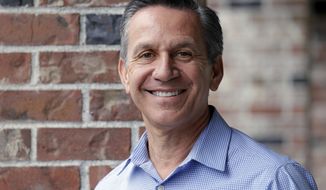 File - In this March 26, 2018 file photo, Dino Rossi, a former state senator now running for Washington state&#39;s 8th District, poses for a portrait in Issaquah, Wash. The two candidates vying for Washington state&#39;s 8th Congressional district seat are set to debate Wednesday night Oct. 17, 2018, in their only joint appearance ahead of one of the tightest midterm races in the country. Democrat Dr. Kim Schrier is a first-time candidate who has the backing of the national party, and Republican Dino Rossi, a longtime state legislator with wide name recognition, will meet at Central Washington University in Ellensburg. (AP Photo/Elaine Thompson, File)