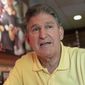Democrat Senator Joe Manchin speaks about his recent vote in the Senate to confirm Brett Kavanaugh, Sunday, Oct. 7, 2018 at IHOP Charleston W.Va. A day after Manchin broke with his party on what may be the most consequential vote of the young Trump era, the West Virginia Democrat faces a political firestorm back home.(AP Photo/Tyler Evert)