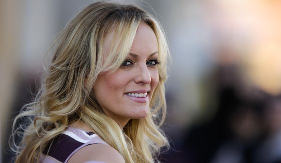 In this Oct. 11, 2018 photo, adult film actress Stormy Daniels attends the opening of the adult entertainment fair &#39;Venus&#39; in Berlin, Germany. When President Donald Trump called Daniels “horseface” on Twitter, he added to his long list of creative, some say misogynistic, descriptions for women. A look at how Trump’s words, and his attitude, might play out three weeks before an election that features a record number of women candidates.  (AP Photo/Markus Schreiber)