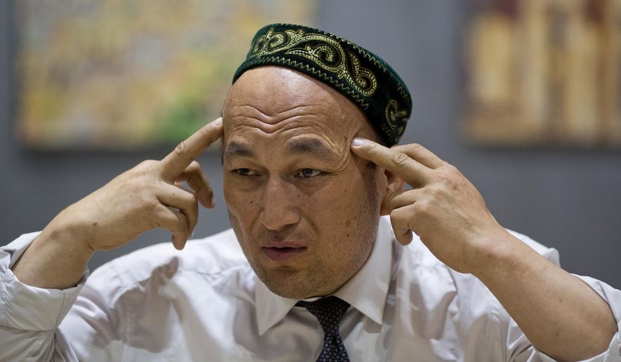 FILE - In this March 29, 2018, file photo, Omir Bekali talks about the psychological stress he endures in a Chinese internment camp during an interview in Almaty, Kazakhstan. Bekali, a former detainee in China&#x27;s internment camps for Muslims, says his application for a visa to visit the United States was rejected despite an invitation to speak at Congress about his ordeal. (AP Photo/Ng Han Guan, File)