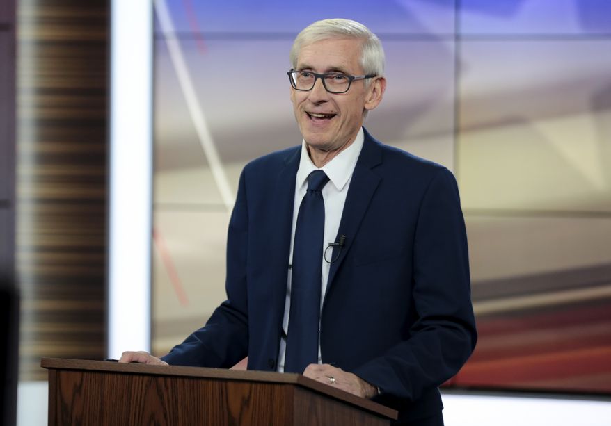 Democratic Challenger Tony Evers speaks during a 10-minute media event before the start of their gubernatorial debate with Gov. Scott Walker, a Republican, hosted by the Wisconsin Broadcasters Association Foundation in Madison, Wis., Friday, Oct. 19, 2018. (Steve Apps/Wisconsin State Journal via AP)