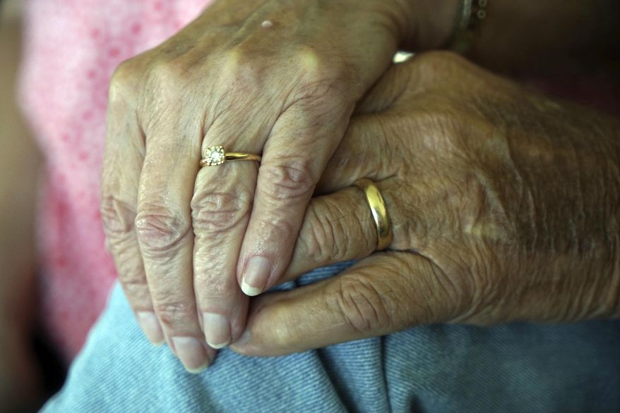 Charles and Betty-Jean Morrison will be married for the second time in a double wedding with their son. The Morrison's found out that after 61 years of marriage that their marriage certificate did not exist because a resident who was a notary that handle marriage licenses never mailed it to the State of New Jersey where they were married. (Jennifer Corbett /The News Journal via AP) /The News Journal via AP)