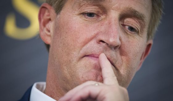 Sen. Jeff Flake, Arizona Republican, participates in an interview at the The Atlantic&#39;s &quot;The Constitution in Crisis&quot; forum in Washington on Oct. 2, 2018. (Associated Press) **FILE**