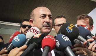 Turkey&#39;s Foreign Minister Mevlut Cavusoglu speaks to the media after a meeting with U.S. Secretary of State Mike Pompeo at the Esenboga Airport in Ankara, Turkey, Wednesday, Oct. 17, 2018.  Pro-government newspaper Yeni Safak on Wednesday said it had obtained audio recordings of the alleged killing of Saudi writer Jamal Khashoggi inside the Saudi Arabia&#39;s Consulate in Istanbul on Oct. 2.(Cem Ozdel/Turkish Foreign Ministry via AP, Pool)