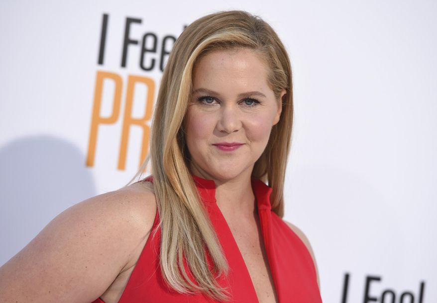 FILE - In this April 17, 2018 file photo, Amy Schumer arrives at the world premiere of &amp;quot;I Feel Pretty&amp;quot; at the Westwood Village Theater in Los Angeles.  Schumer says don’t look for her in a Super Bowl commercial this time around. She’s sitting this one out in support of Colin Kaepernick and his take-a-knee protest against racism.  The comedian and actress explained her stance at length Friday, Oct. 19 on Instagram, challenging white NFL players to kneel as well. Addressing them directly, she wrote: “Otherwise how are you not complicit?”  (Photo by Jordan Strauss/Invision/AP, File)