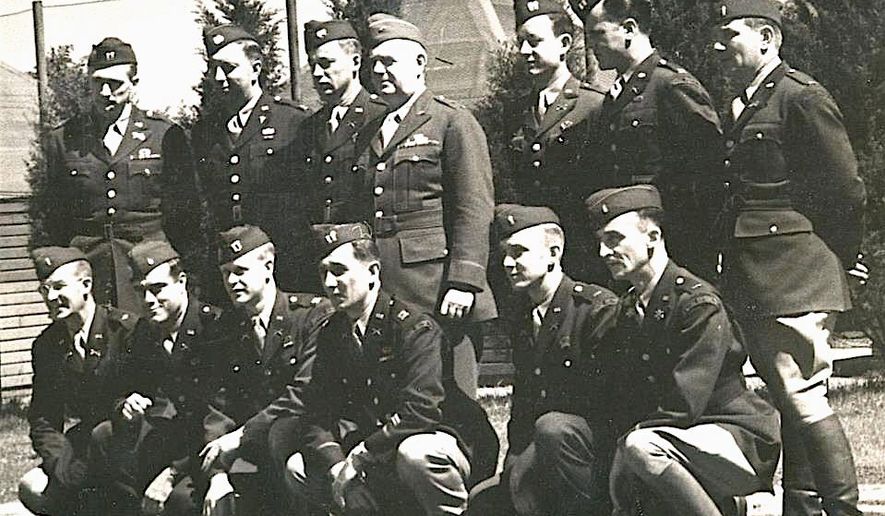 Original members of the Office of Strategic Services, the predecessor of the CIA, pose with Gen. William "Wild Bill" Donovan (standing fourth from left), who founded the clandestine organization in 1942. (Oss Society)