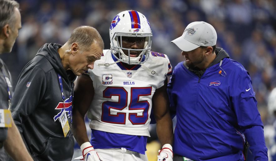 Buffalo Bills running back LeSean McCoy (25) is assisted off the field after being injured during the first half of an NFL football game against the Indianapolis Colts in Indianapolis, Sunday, Oct. 21, 2018. (AP Photo/John Minchillo)