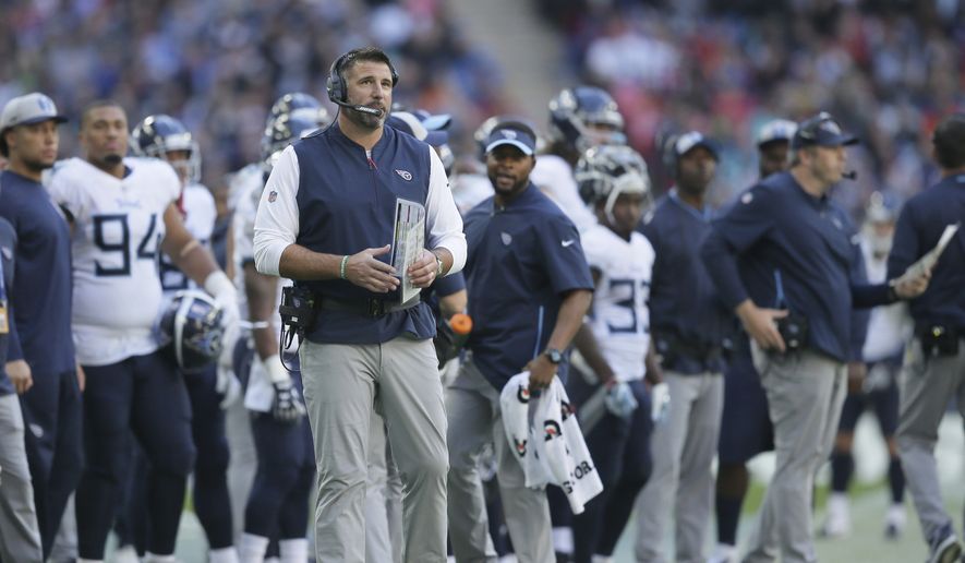 Tennessee Titans head coach Mike Vrabel stands on the touchline during the first half of an NFL football game against Los Angeles Chargers at Wembley stadium in London, Sunday, Oct. 21, 2018. (AP Photo/Tim Ireland) **FILE**