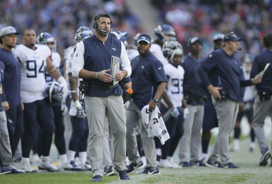 Tennessee Titans head coach Mike Vrabel stands on the touchline during the first half of an NFL football game against Los Angeles Chargers at Wembley stadium in London, Sunday, Oct. 21, 2018. (AP Photo/Tim Ireland) **FILE**