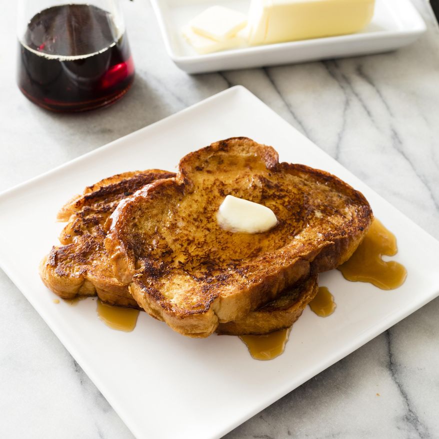 This undated photo provided by America's Test Kitchen in October 2018 shows French toast in Brookline, Mass. This recipe appears in the cookbook “All-Time Best Brunch.” (Daniel J. van Ackere/America's Test Kitchen via AP)