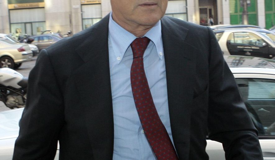 FILE -- OBIT - In this April 17, 2007 file photo Gilberto Benetton arrives for a Telecom board meeting in Milan, Italy. Gilberto Benetton, co-founder of the Benetton Group, died Monday, Oct. 22, 2018. (AP Photo/Luca Bruno, file)