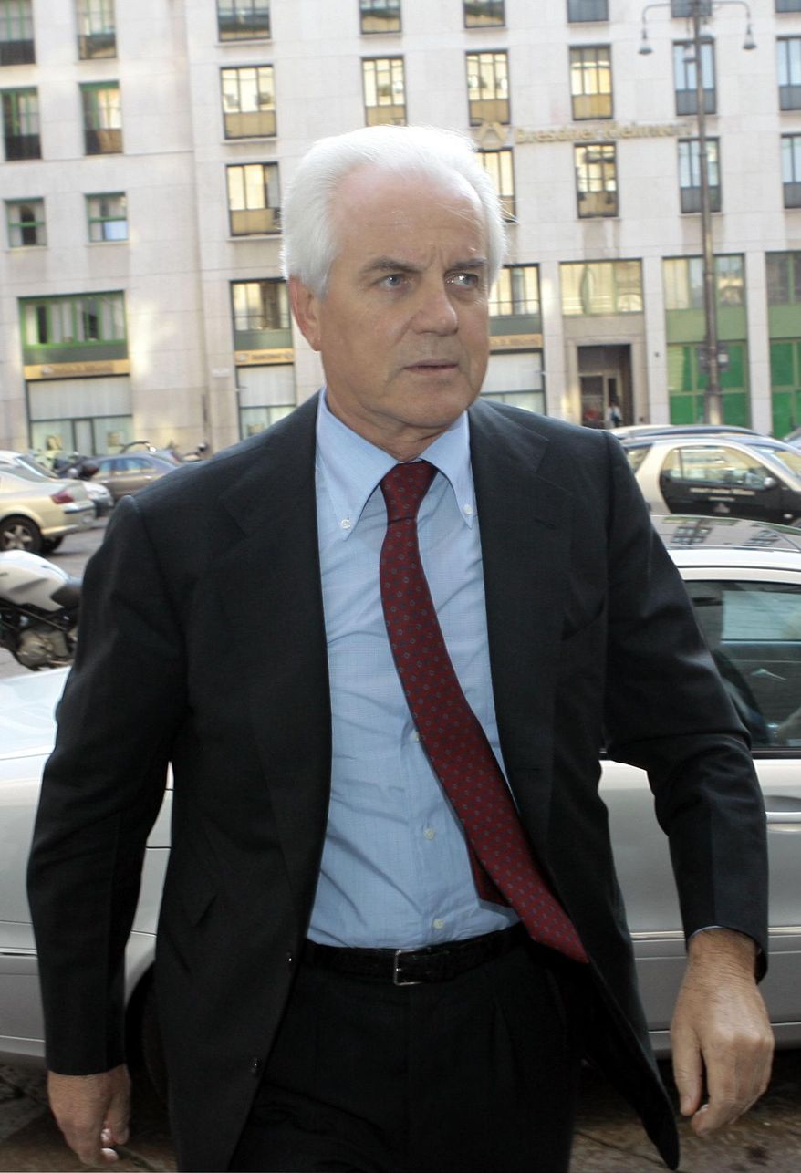 FILE -- OBIT - In this April 17, 2007 file photo Gilberto Benetton arrives for a Telecom board meeting in Milan, Italy. Gilberto Benetton, co-founder of the Benetton Group, died Monday, Oct. 22, 2018. (AP Photo/Luca Bruno, file)