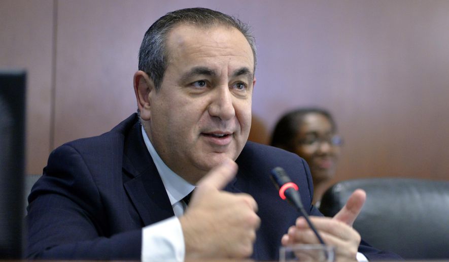 This Nov. 12, 2014 photo made available by the Organization of American States shows Maltese academic Joseph Mifsud during a meeting in Washington, USA. It was Mifsud who allegedly dropped the first hint that the Russians were interfering into the 2016 U.S. presidential election and he has not been seen publicly for nearly a year. An Associated Press investigation published Monday, Oct. 22, 2018, shows it isn’t the first time Mifsud has gone to ground. (Juan Manuel Herrera/OAS via AP)