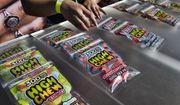 In this Saturday, Oct. 20, 2018 photo medicated High Chew edibles are shown on display and offered for sale at the cannabis-themed Kushstock Festival at Adelanto, Calif. (AP Photo/Richard Vogel)