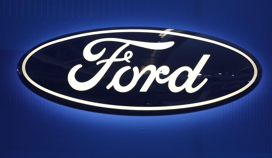 FILE - This Feb. 11, 2016, file photo shows the Ford logo on display at the Pittsburgh International Auto Show in Pittsburgh. Ford Motor Co. revamped its Asian operations and made its China business a stand-alone unit, recruiting the head of local automaker Chery Automobile to be its new CEO. The company said Wednesday, Oct. 24, 2018, that industry veteran Chen Anning will replace Jason Luo, who quit earlier this year, just months after taking over at Ford in China. (AP Photo/Gene J. Puskar, File)