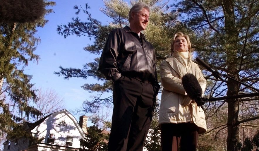 FILE - In this Jan. 6, 2000 file photo, Bill and Hillary Clinton stand in the driveway of their new home in Chappaqua, N.Y. A U.S. official says a &quot;functional explosive device&quot; was found at Hillary and Bill Clinton&#39;s suburban New York home. (AP Photo, File) **FILE**