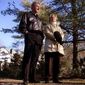 FILE - In this Jan. 6, 2000 file photo, Bill and Hillary Clinton stand in the driveway of their new home in Chappaqua, N.Y. A U.S. official says a &quot;functional explosive device&quot; was found at Hillary and Bill Clinton&#39;s suburban New York home. (AP Photo, File) **FILE**