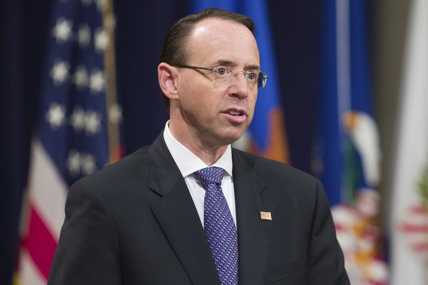 Deputy Attorney General Rod Rosenstein speaks during an event to announce new strategic actions to combat the opioid crisis at the Department of Justice's National Opioid Summit in the Great Hall at the Department of Justice, Thursday, Oct. 25, 2018, in Washington. (AP Photo/Alex Brandon) ** FILE **
