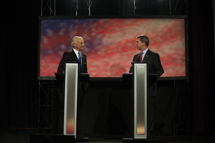 Republican Gov. Henry McMaster, left, and Democratic challenger, state Rep. James Smith meet during a debate, Thursday, Oct. 25, 2018 at Greenville Technical College in Greenville, S.C. (Lauren Petracca/The Post And Courier via AP)