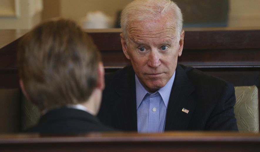 Former Vice President Joe Biden talks with 27th Congressional District Democratic candidate Nate McMurray after greeting workers and patrons in a restaurant, Thursday, Oct. 25, 2018, in Lancaster N.Y. (AP Photo/Jeffrey T. Barnes) ** FILE **