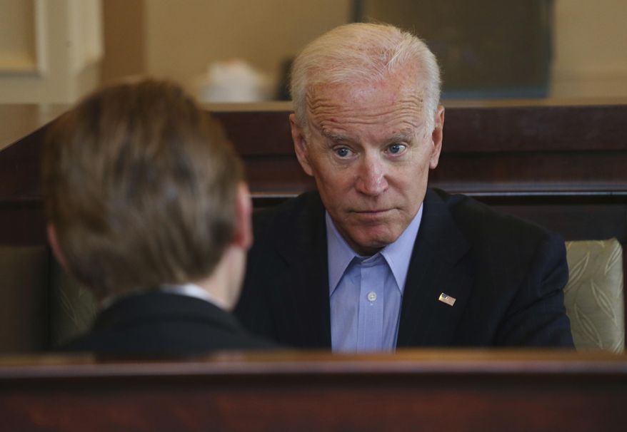 Former Vice President Joe Biden talks with 27th Congressional District Democratic candidate Nate McMurray after greeting workers and patrons in a restaurant, Thursday, Oct. 25, 2018, in Lancaster N.Y. (AP Photo/Jeffrey T. Barnes) ** FILE **